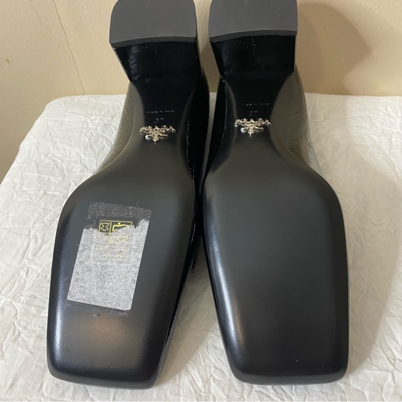 Prada Triangle-plaque square-toe black heeled patent leather loafers - Picture 9 of 11